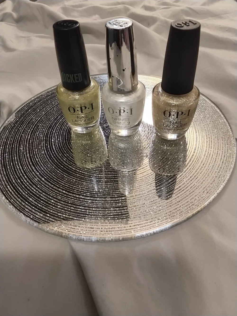 OPI Trio in White, Pale Yellow, Gold Glitter